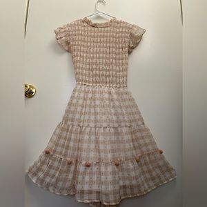 Dress wore twice,color “nude” and white,size medium,knee long length,